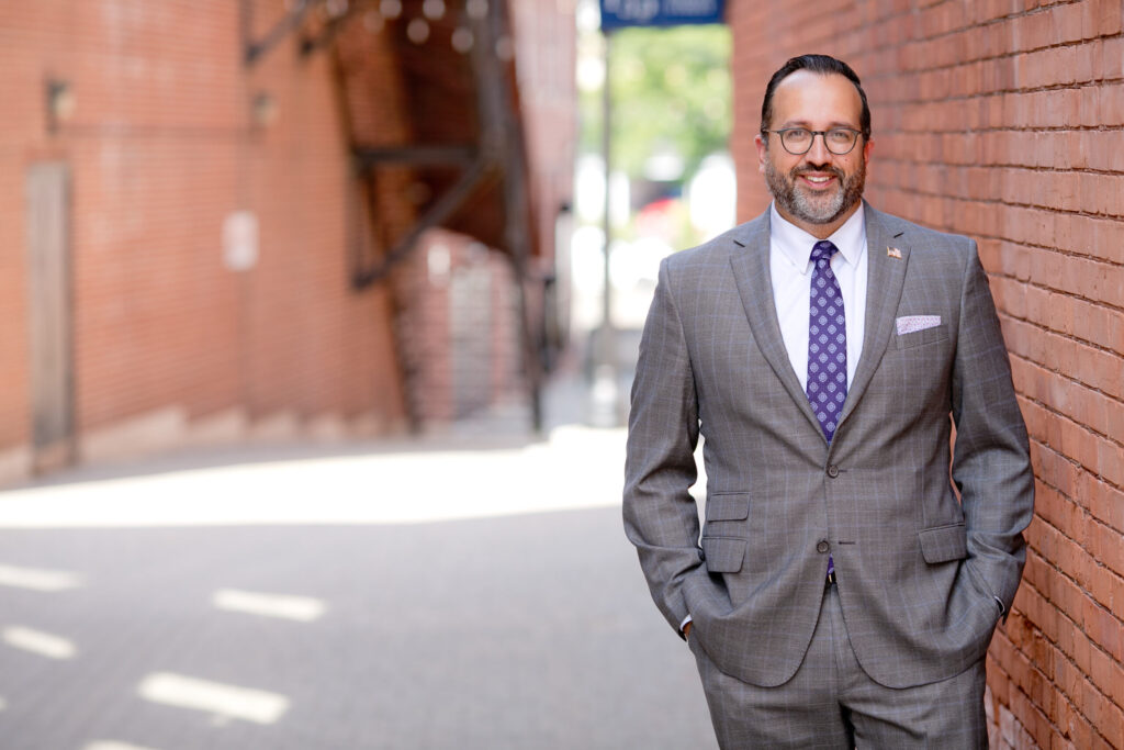 Mayor Roberto Alves walking with Danbury constituents
